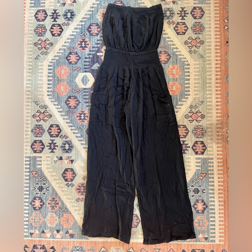 Black strapless jumpsuit. Size M